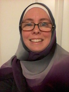 Laura P wears a hijab in the asexual pride colors. Photo by author.