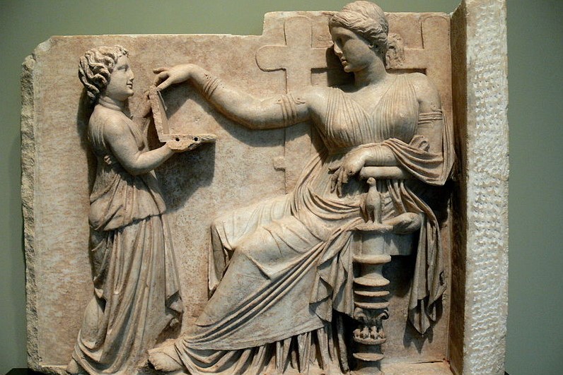 (Gravestone of a woman with her slave child-attendant, Greek, c. 100 BC, Getty Villa, Usa; Source, Wiki Commons, CC BY SA 3.0).