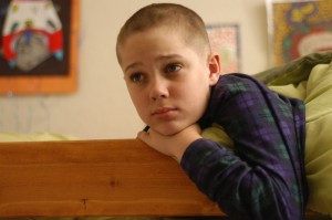 Mason sports a new luck... begrudgingly... in "Boyhood."