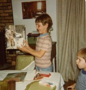 Jeffrey Overstreet at 7 years old, admiring a new Star Wars folder for school.