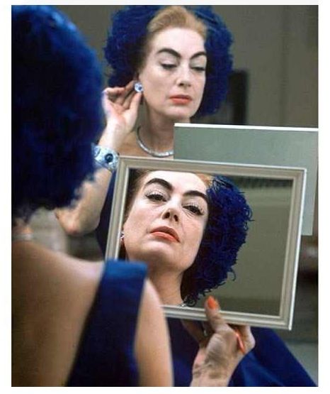 Eve Arnold's famous picture of Joan Crawford undergoing "construction." 